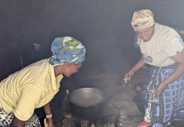 Cooking using a typical 3 stone fire Nakuru